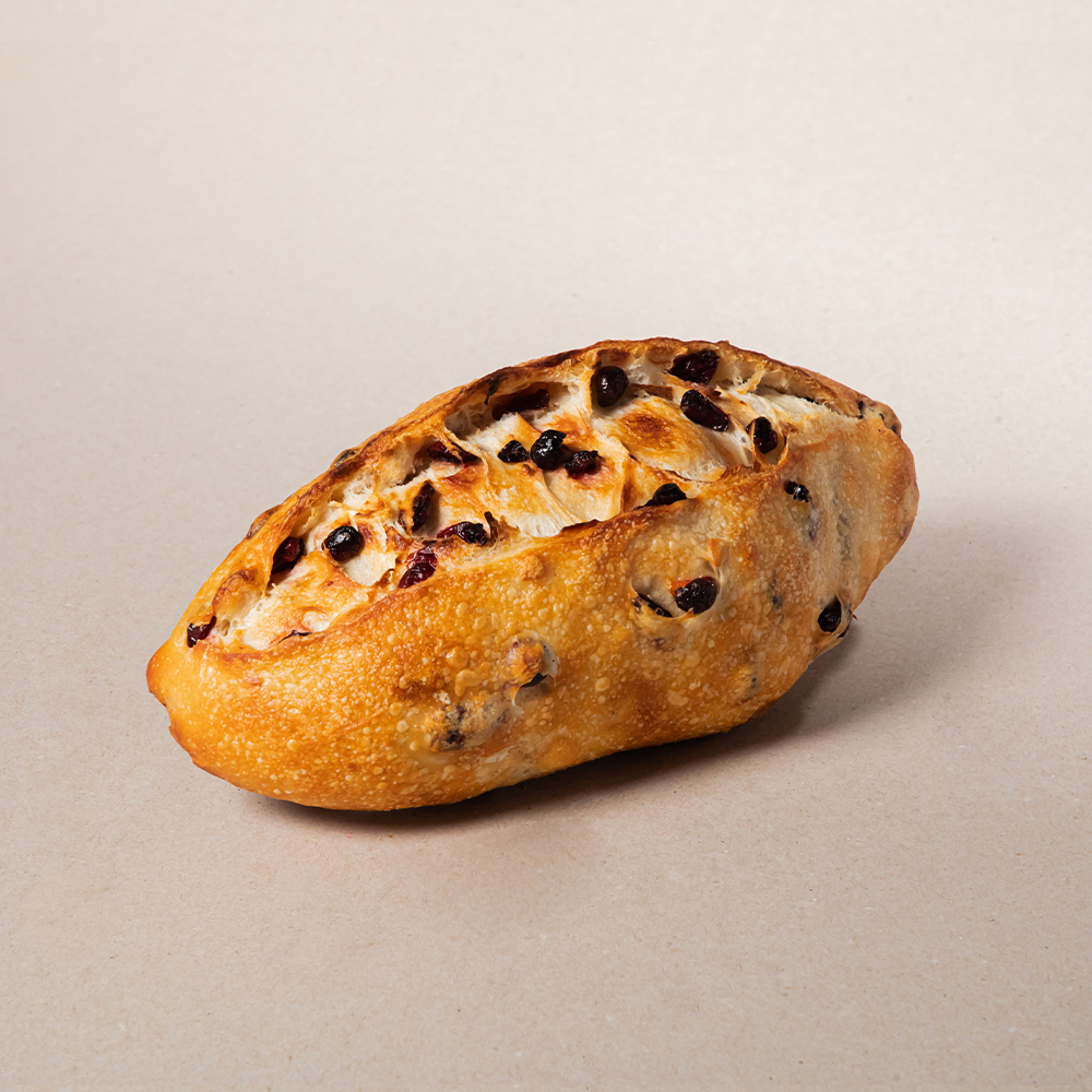 Pan rústico con arándano y almendra en panadería esperanza 